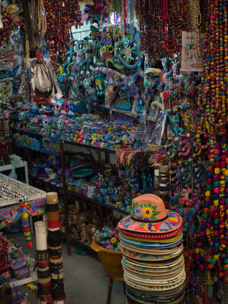 store with colorful souvenirs (human skulls and cow skulls) in mexico. san miguel de allende, mexico, february 25, 2021.