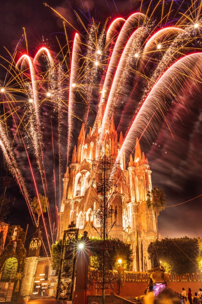 fireworks in front of the parish of san miguel arcangel church in san miguel de allende, mexico